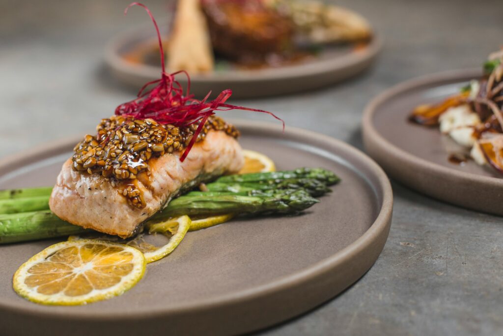 Fresh fish with lemon and asparagus, a popular dish to eat on the Amalfi Coast in late summer.